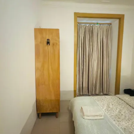 Frank's House & Happy Belem بيت ضيافة